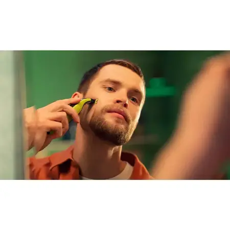 Aparat hibrid de barbierit si tuns barba Philips OneBlade QP2734/20, Acumulator, Pieptene reglabil 5 in 1, Autonomie 60 minute, Wet & Dry